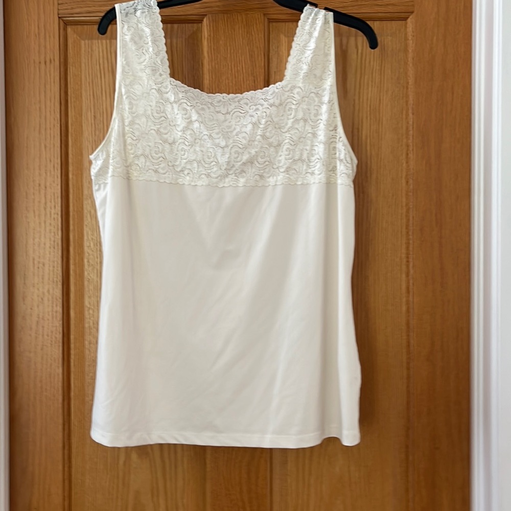 Beautiful tank with lace accent.